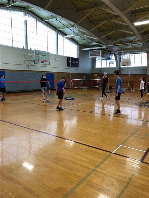 Students playing badminton at Lawrence 